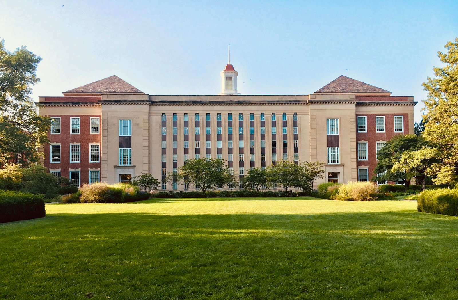 University campus with a green lawn